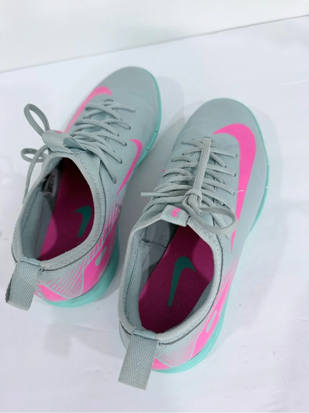 Kids Grey Athletic Shoes with Pink Swoosh and Teal Sole
